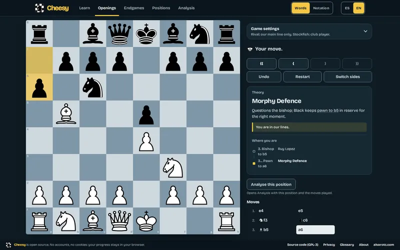 A game of the Ruy Lopez as White, in the dark theme: the board after Black’s third move, the notice “Your move”, the theory panel with the Morphy Defence explained in words and the note “You are in our lines”, and the move list.